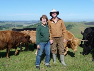 john &
                Lesley with cows